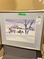 Framed print showing winter scene with horse and sleigh, mat, metal frame