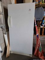 Front view of upright freezer closed