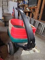 Front angled view showing overall wagon, pull handle and wheels