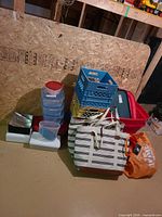 Group shot showing tubs, milk crates, totes, containers