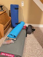 Entire lot with step platform, blue mat, blue bolster, dumbbells, ankle weight, accessories bag