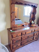 Dresser with attached mirror showing full view