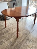 Full view of dining table with leaf inserted