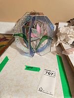 Both stained glass suncatchers showing octagonal shape and size reference