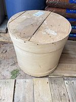overall view of round wooden box with lid