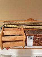 Natural wood sorter with other items for context