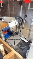 Full view corded bench drill press on workbench