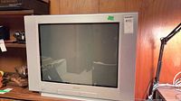 Front view of Sony 27" CRT TV on shelf
