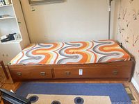 Daybed with cushion in place, drawers closed