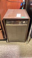 Full view of Westinghouse woodgrain console dehumidifier front