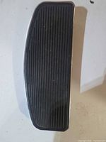 Top view of footboard showing ribbed rubber surface