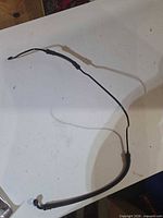 Full view of brake line showing overall length and both fittings