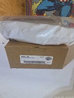 Outer box with Harley-Davidson label and part number 45964-86 visible