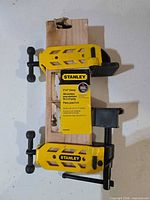 Front view of Stanley 2"x4" clamp with packaging tag attached