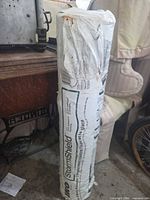 Full view of wrapped roll standing upright