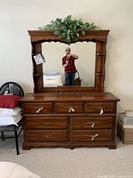 Front view showing dresser and attached mirror