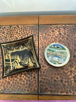 Top view showing both decorative plates on table