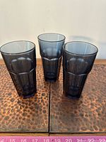 Three smoky blue Duratuff tumblers front view