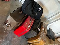 Stacked view of all five luggage pieces