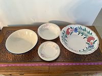 Top view of all four ceramic pieces showing patterns and sizes