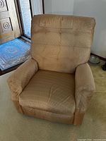 Front view of tan fabric recliner