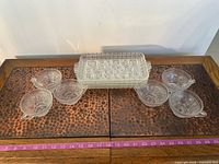 overview of tray and six cups arranged on table