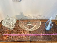 Overview of all three glass items with measuring tape for scale