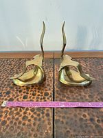 Front view of both brass bookends