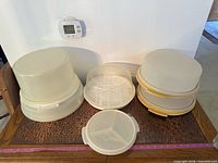 Group shot of all Tupperware carriers, bases and inserts