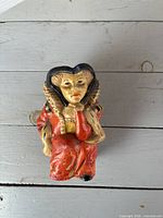 Front view of queen figural pitcher mug