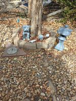 Dog statue, pagoda lantern, angel head & wings, metal bird stake