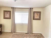 Both framed prints hanging on wall for scale and matching set