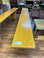 top view of long pine bench showing surface and grain