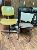 Both chairs side by side showing overall design and wear