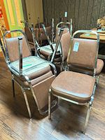 Front three-quarter view showing all six stacked chairs