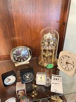 Group shot of all clocks in display case