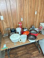 Full lot on folding table showing all kitchen items together