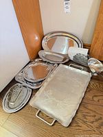 Group of trays, napkin holder, sauce pourer