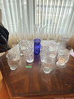 All twelve vases arranged on table