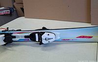 Close-up of Head ski showing binding and graphics