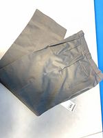 Slacks folded showing overall colour and fabric