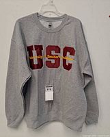 Front view showing full sweatshirt and tag