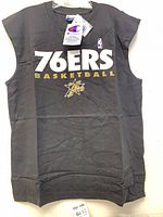 Front view of black sleeveless 76ers shirt showing graphics and size tags