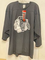 Front view showing logo and tag