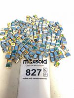 Pile of blue-topped Cool Links modular bracelet links