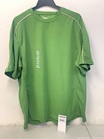 Front view of green Denver Hayes T-shirt with size tag visible