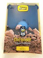 Front view of sealed OtterBox Defender Series iPad mini 4 case in retail packaging
