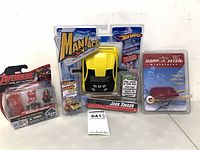 All three packaged toys displayed together