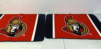 Both Ottawa Senators mats front view showing design and colors