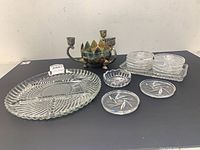 Group view of all crystal pieces and metal candle holder